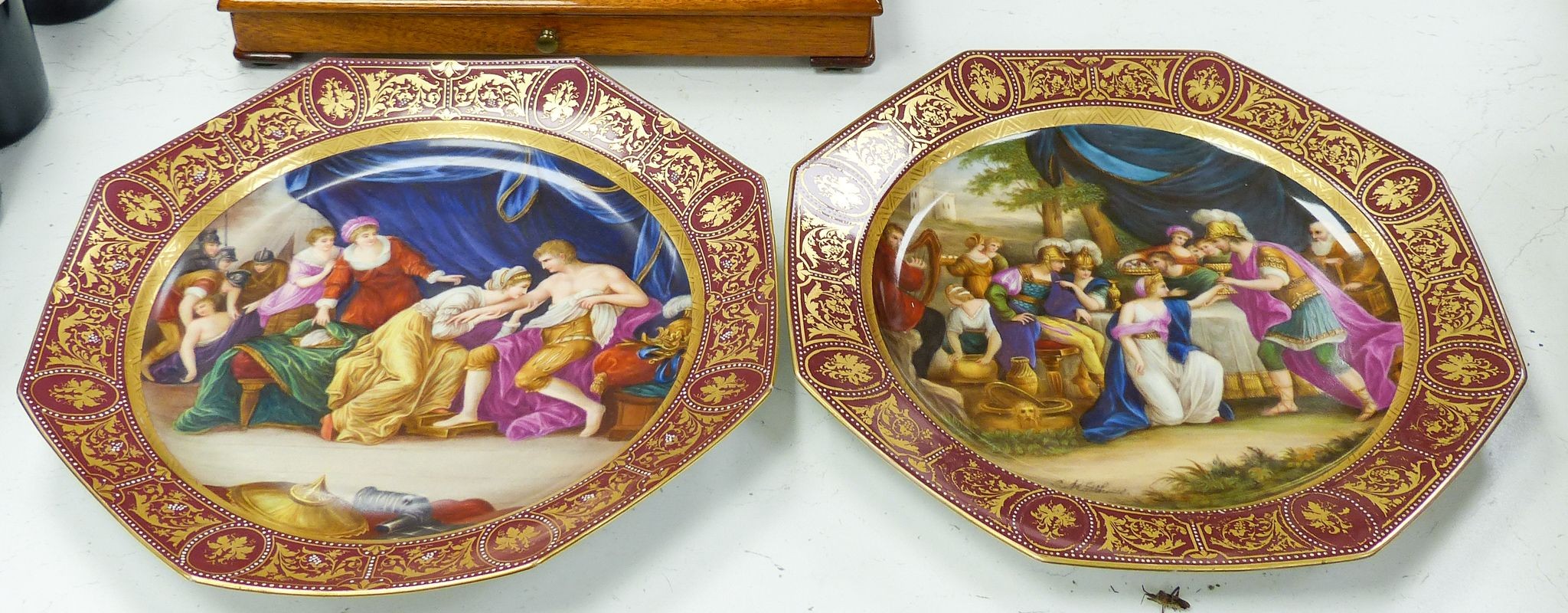 A pair of Vienna style octagonal chargers, with central classical cartouche 34.5cm